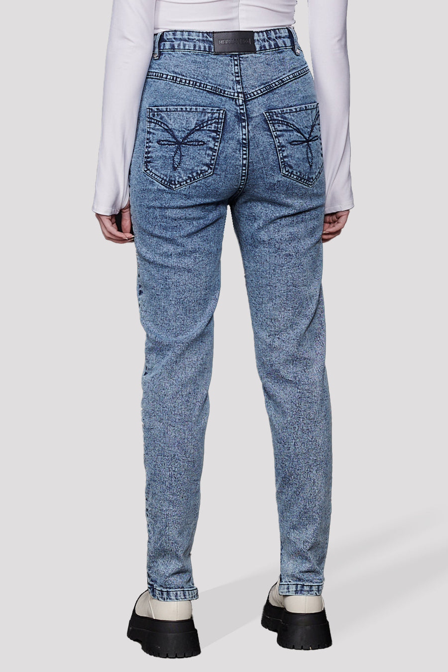 HIGH RISE SKINNY JEANS WITH HEM POPPER DETAIL - BLUE ACID WASH