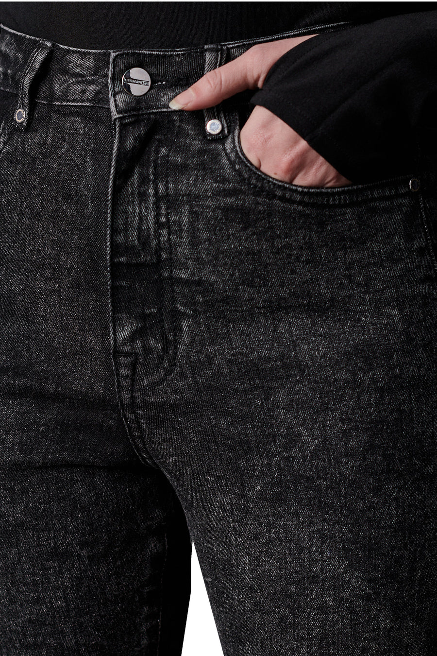 HIGH RISE SKINNY JEANS WITH HEM POPPER DETAIL - BLACK ACID WASH