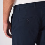 Close up of the back pocket on these navy blue chinos slim fit.