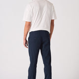 Full back view of the navy blue chinos slim fit showing the cut.