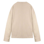 Beige oversized v neck jumper flat back lay