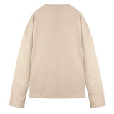 Beige oversized v neck jumper flat back lay