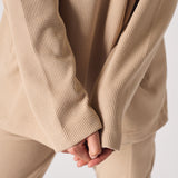 Beige oversized v neck jumper tonal logo embroidery