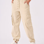 Full length front view of the lightweight beige straight leg cargo pants.