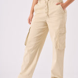 Full body shot of a model wearing Jmojo beige straight leg cargo pants.