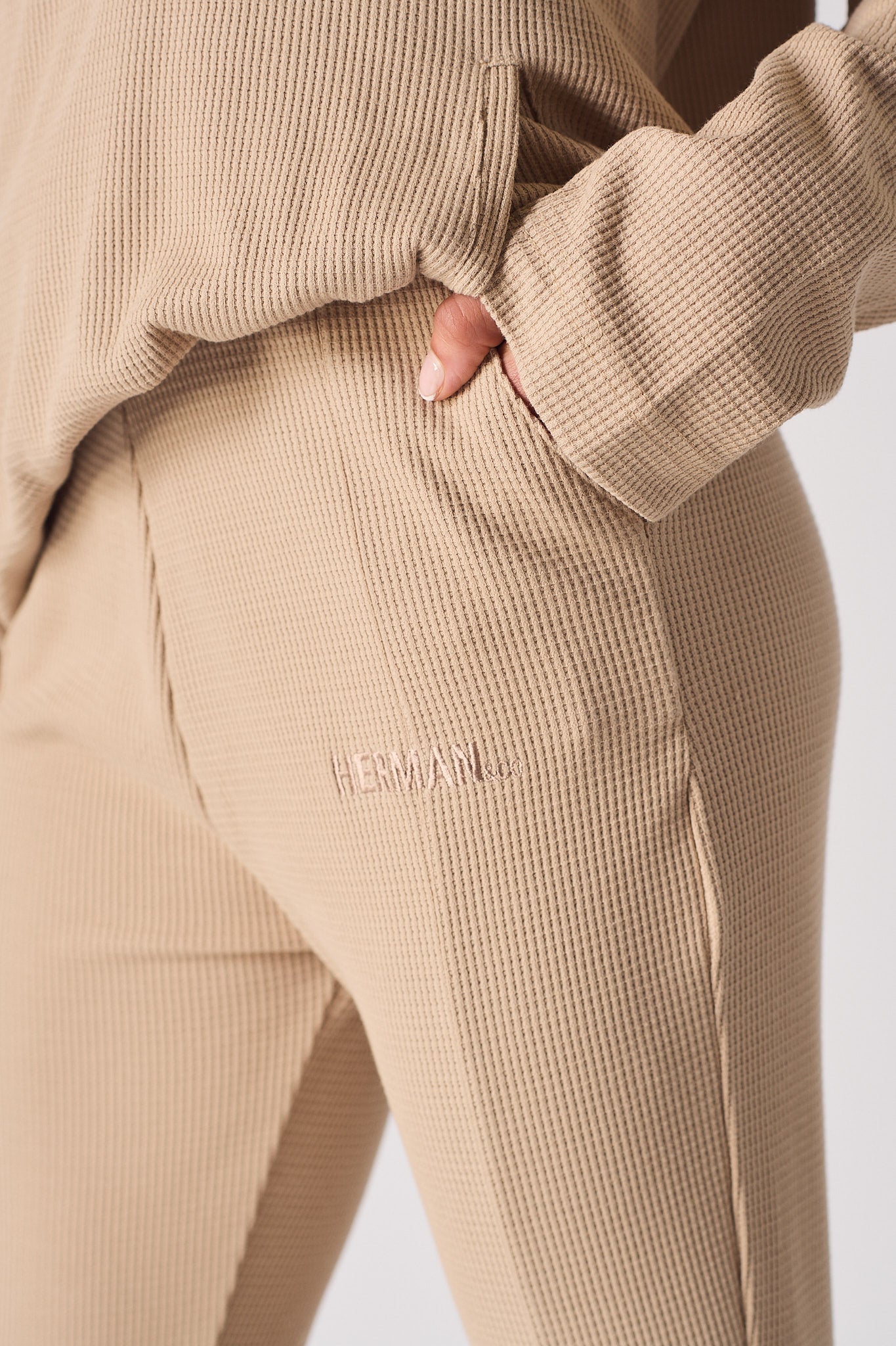 Beige waffle flared joggers logo embroidery detail