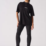 black biker jeans for women styled with oversized t-shirt full look