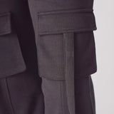 Detail shot of the leg and fit on black cargo trousers womens straight leg.
