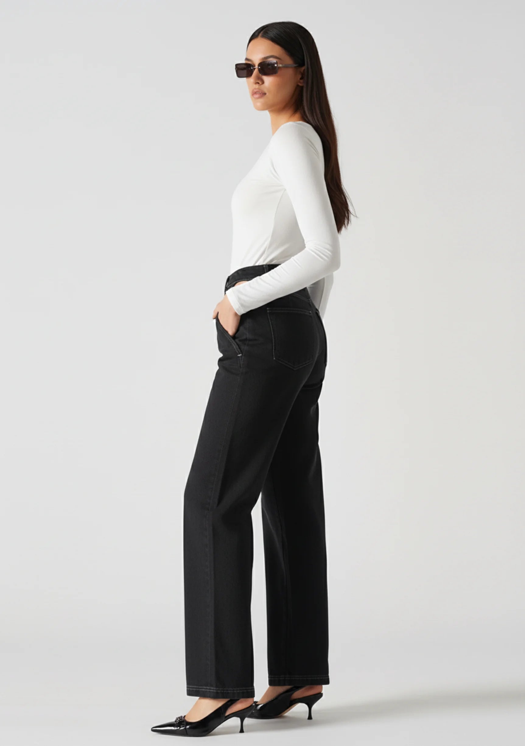 Black cut out straight leg jeans side profile fit