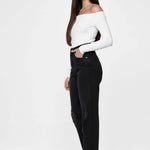 Side profile view of a model wearing Black Denim Straight Leg Women's Jeans