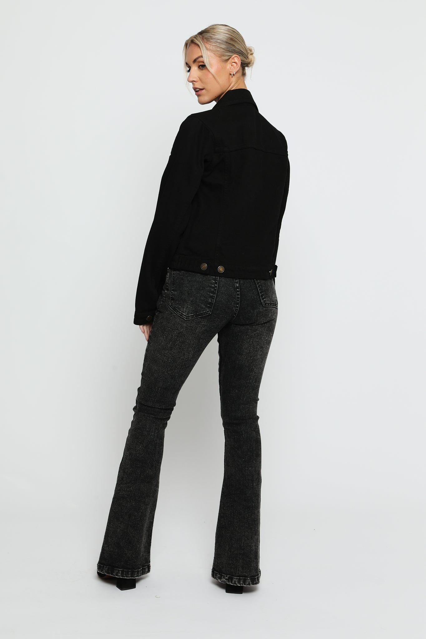 black-denim-trucker-jacket-back-side-angle