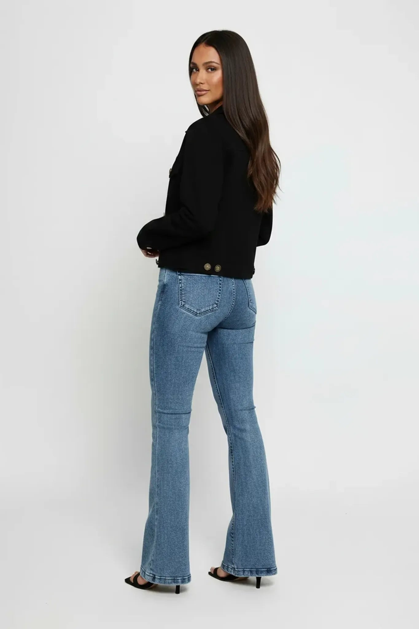 black-denim-trucker-jacket-back-side-angle