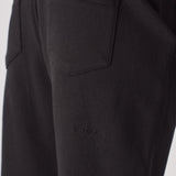 'Fit For All' embroidered detail on the back of the black tapered joggers