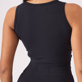 Detailed shot of the back profile and neckline of a black racer neck crop top