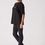 black high waisted skinny biker jeans women side view ribbed panel