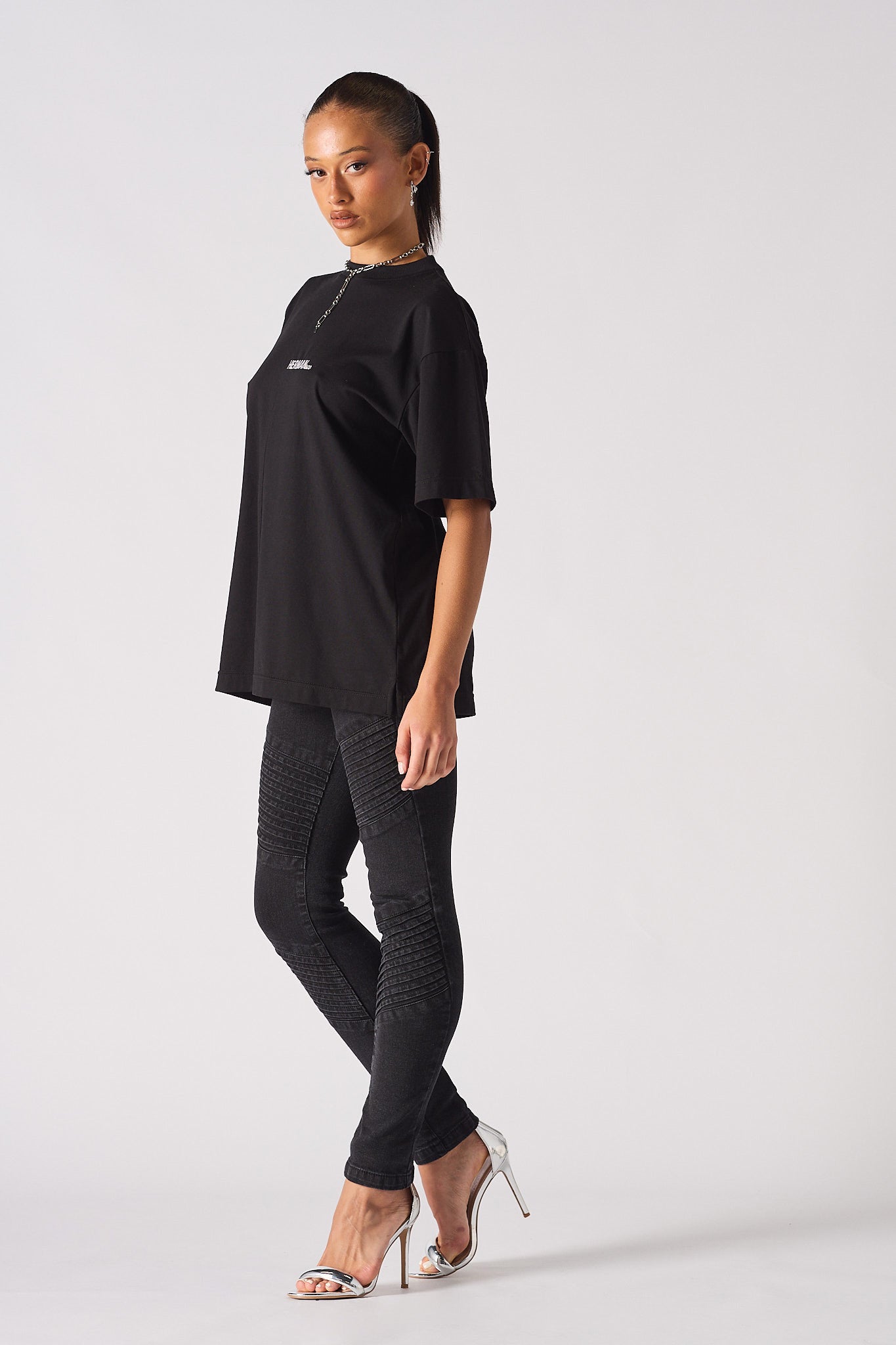 black high waisted skinny biker jeans women side view ribbed panel