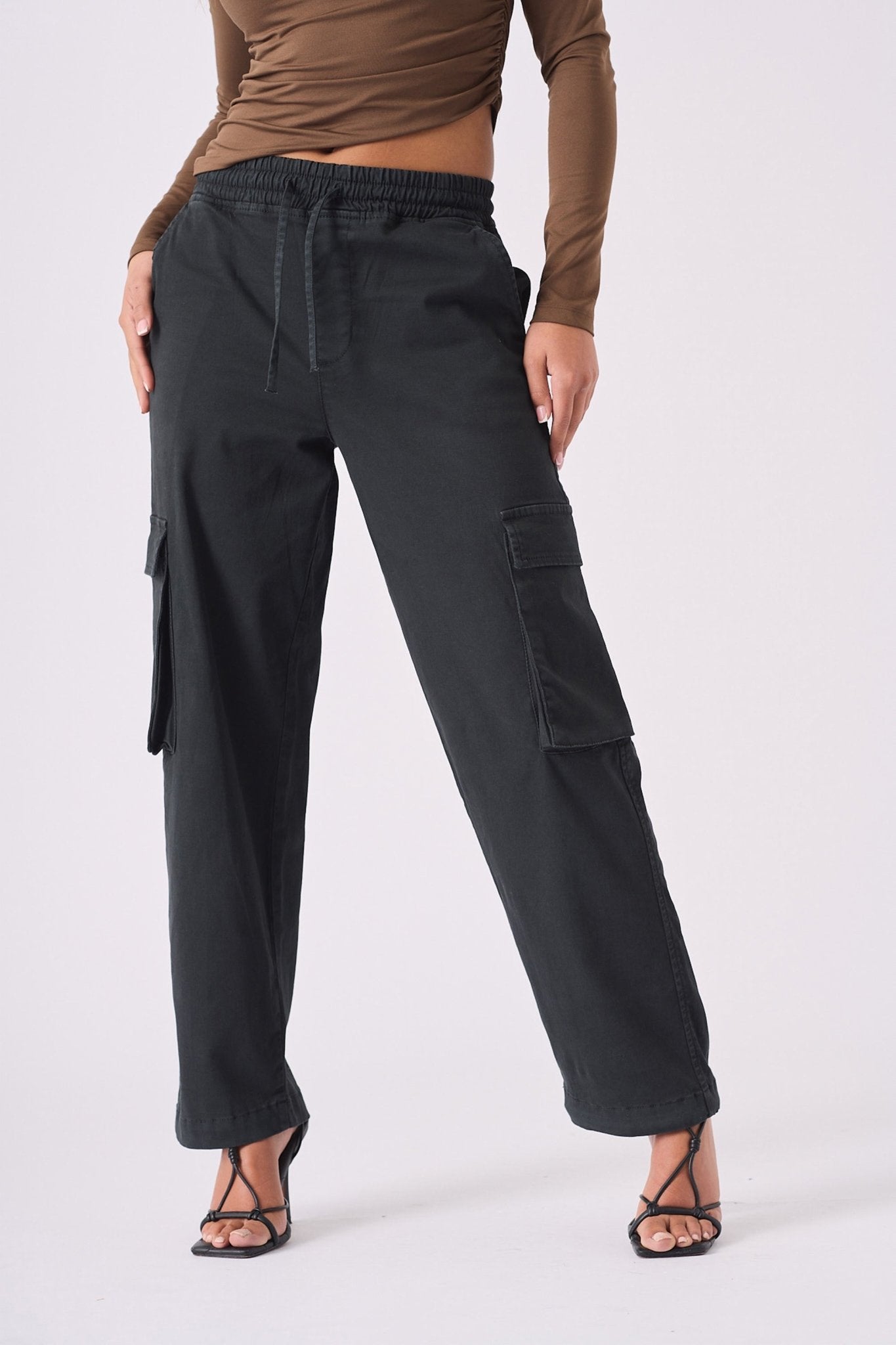 Full front shot of the durable cotton black straight leg cargo pants women's.