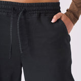 Close up showing the drawstring waist of the black straight leg cargo pants women's.