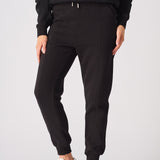 Front shot from the waist down of the smart black tapered joggers womens.