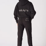 Back view of the black tapered joggers womens showing the clean silhouette.