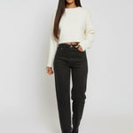Model walking in Black Wash Curved Seam Straight Leg Jeans