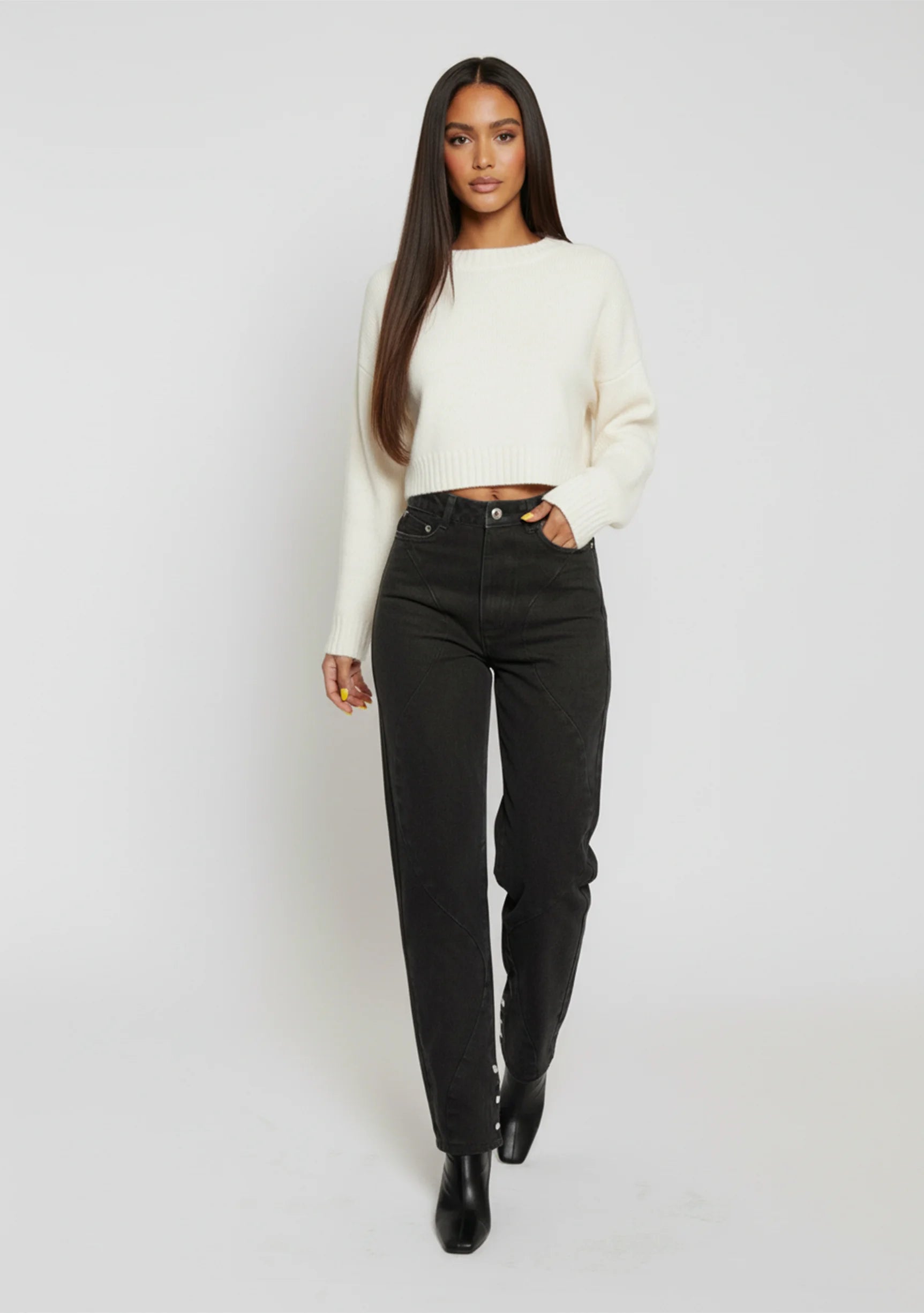 Model walking in Black Wash Curved Seam Straight Leg Jeans