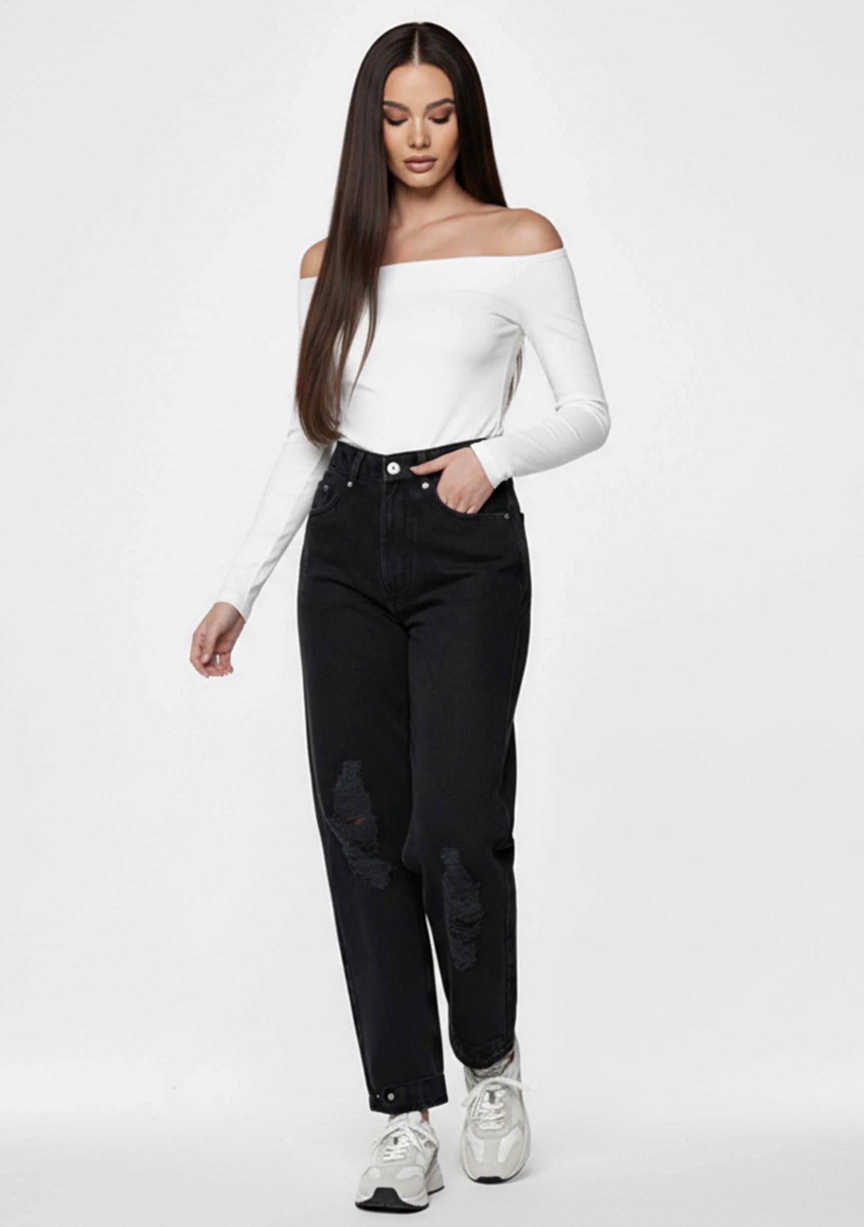 Model walking towards the camera in Black Wash Denim Pants Straight Leg Women