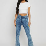 Front view of women's blue acid wash bootcut jeans