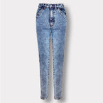 Front view of the blue acid wash skinny jeans, laid flat