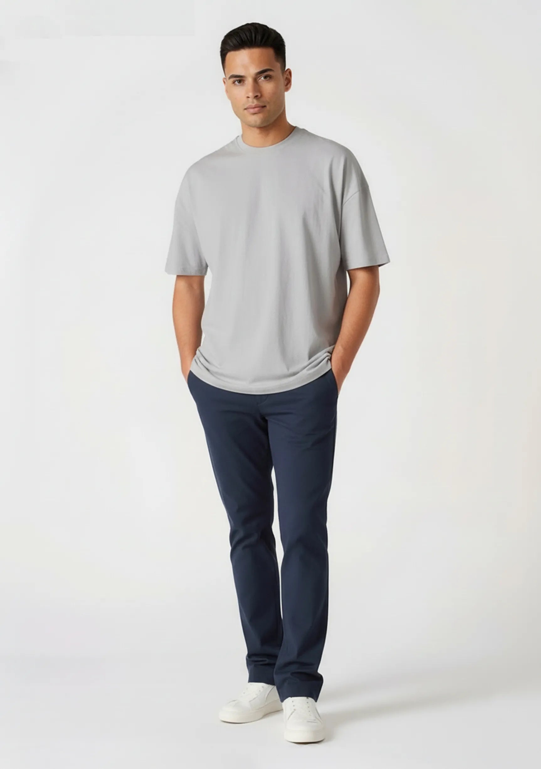 Full body front view of a man wearing Jmojo blue chinos mens in a stretch slim fit.