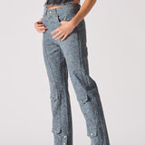 Person wearing blue denim cargo pants on a white background
