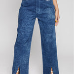 Angled back view showing silver embellished pocket details on blue wide leg jeans