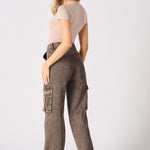 Back view of the wide leg brown cargo jeans showing the flattering high-waisted silhouette.