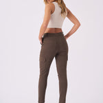 Back view showing the high rise fit and flattering pocket placement on these brown cargo jeans.