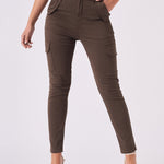 Full length front shot of the brown cargo jeans for women with functional pocket details.