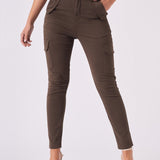 Full length front shot of the brown cargo jeans for women with functional pocket details.