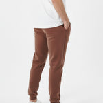 Brown tapered joggers back angled view