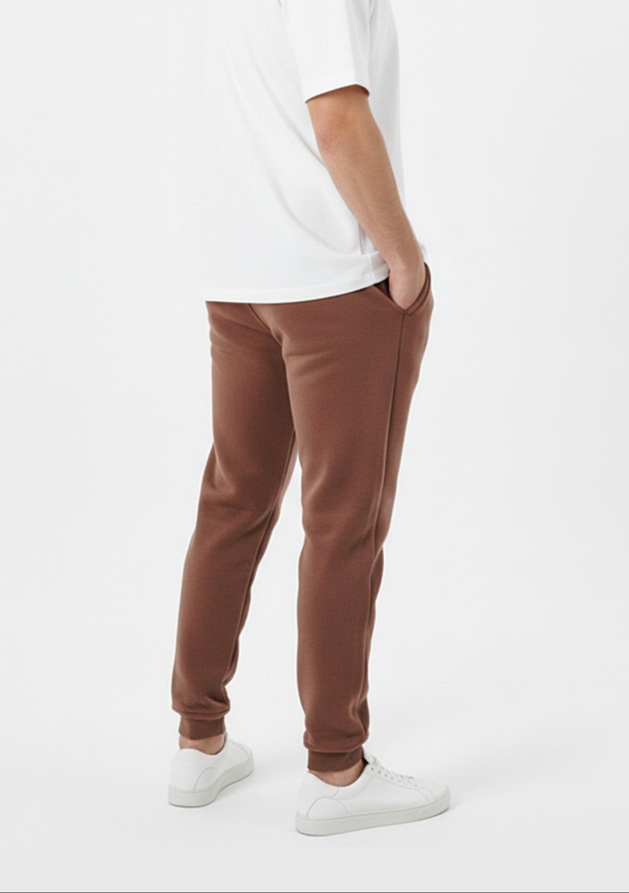 Brown tapered joggers back angled view