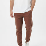 Brown tapered joggers front walking pose