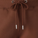Detail shot of the brown drawstring waist on the wide leg joggers