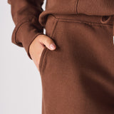 A close up shot of the side pocket on the chocolate brown wide leg joggers