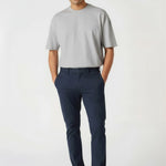 Relaxed casual styling featuring stretch slim fit chino pants blue for men.