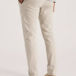 Detail view of the back pockets on stylish cream chinos for men by Jmojo.