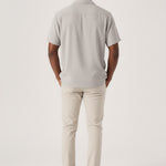 Rear view showing the modern cut and fit of the Jmojo cream colour pant.