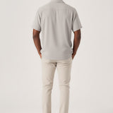 Rear view showing the modern cut and fit of the Jmojo cream colour pant.