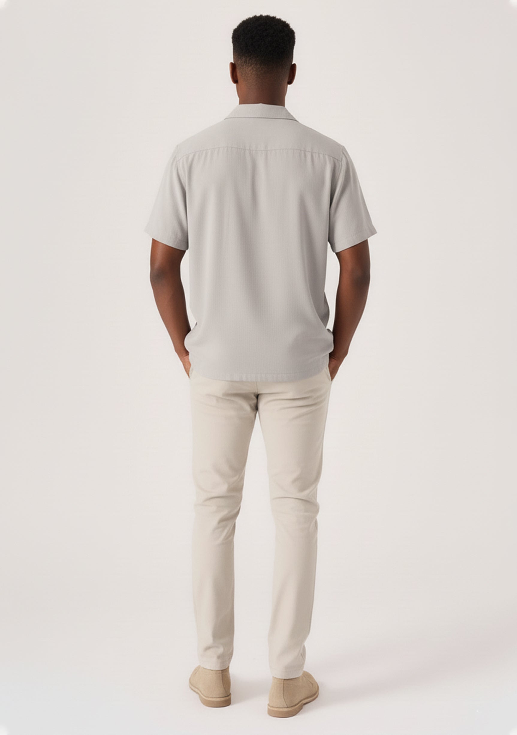 Rear view showing the modern cut and fit of the Jmojo cream colour pant.