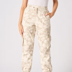 Close up of the practical cargo pocket on the beige tie dye joggers