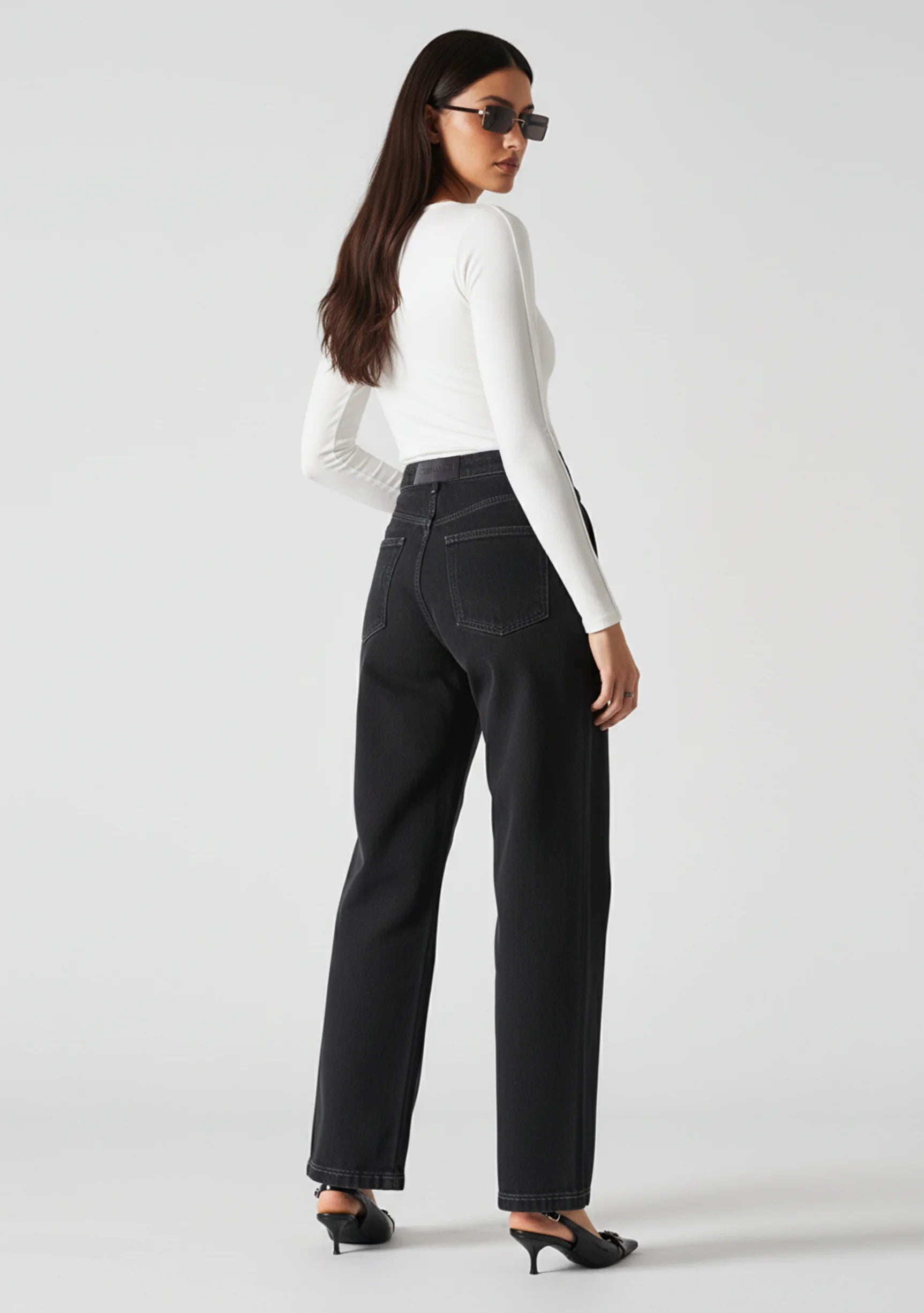 Cut out side straight leg jeans back angle perspective