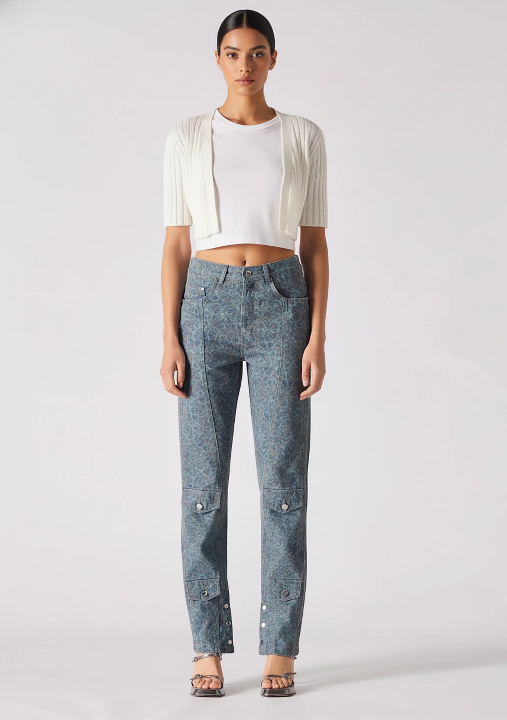 Front view of a model wearing Dark Blue and Grey Speckle Jeans with cargo pockets