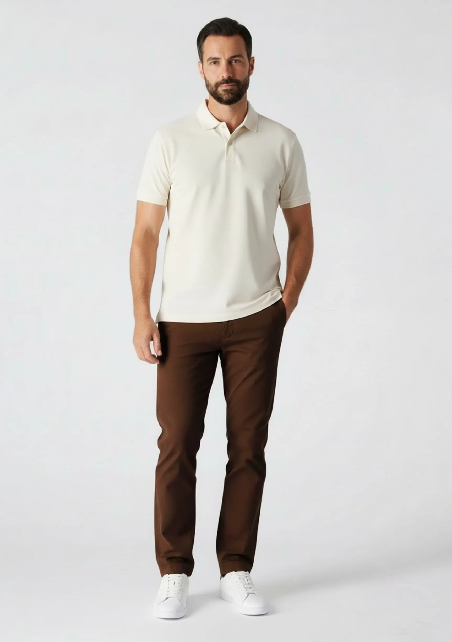 Man standing casually in dark brown trousers mens UK